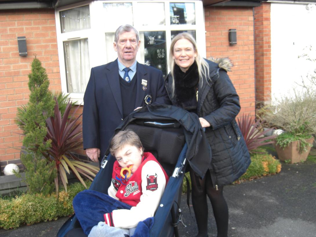 Dylan in his new pushchair with his Mum and Lion Paul Jolly